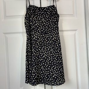 Black dress with white poka dots